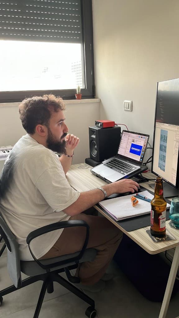 Shaked Barsheshet working at his desk
